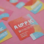 Materiales promocionales coloridos con música y marca Pimpinelas